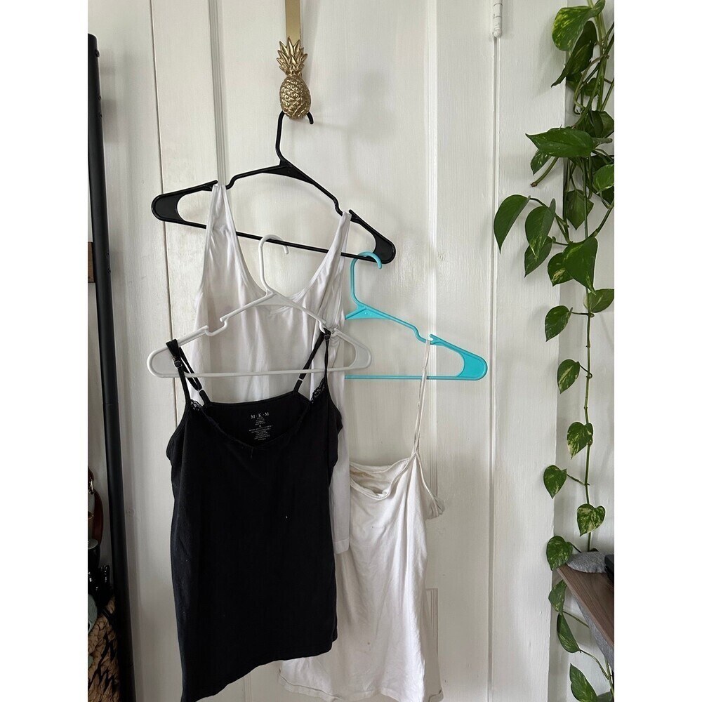 (3) Women’s size Medium Tanktops